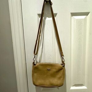 Roots small leather purse.